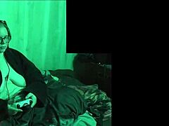 She plays Alan Wake 2 naked with big tits.