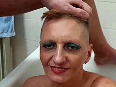 German milf Sandra teases for cum on her face in this intense cumshot.