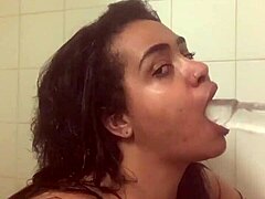 Woman Fucks Herself with Dildo in Shower