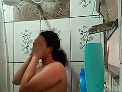 Gorgeous Latina brunette shows off her wet pussy while taking a shower