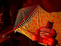 getting frisky in a tent fingering her wet hole in a hammock