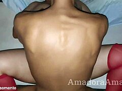 Brunette woman engages in intimate activity with young man