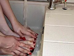 Housewife teases with smelly socks and wet pussy in kitchen