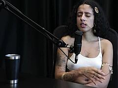 bibi hourani shows tit tattoos?