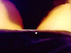 Seductive babe smokes cigarette while performing slow striptease, ripping clothes off provocatively