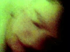 My girlfriend gives a blowjob while fingering herself.