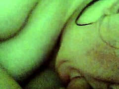 My girlfriend gives a blowjob while fingering herself.
