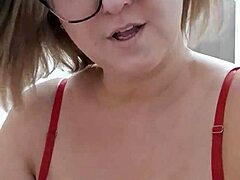 i'm a mature blonde milf showing off my big pussy lips in these shorts, it's so wet and juicy, i can't help but touch it