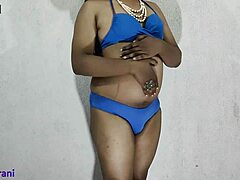 indian shemale crossdresses in blue bikini for solo anal play with big tits exposed