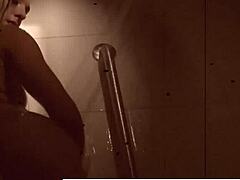 Sexy blonde Dahlia enjoys naughty solo masturbation in steamy shower