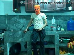 this 25-year-old guy with a big flaccid penis starts masturbating in the kitchen while waiting for his best friend to arrive