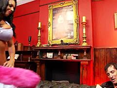 brunette with comical fake boobs enjoys a passionate encounter