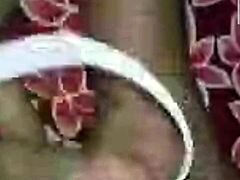 In a casual story, couple enjoys video call sex with big tits and monster big black cock action.