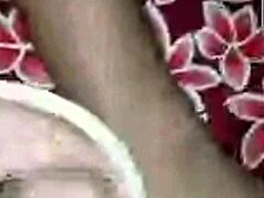 In a casual story, couple enjoys video call sex with big tits and monster big black cock action.