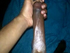 Feeling so aroused while stroking my massive black cock alone at home.