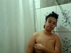 Latina Brunette Teases with Orgasmic Ass and Pussy Play in Shower