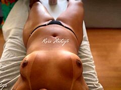 Brazilian wife does topless during massage with massagista seeing her in tiny bikini barely covering pussy as exhibitionist slut