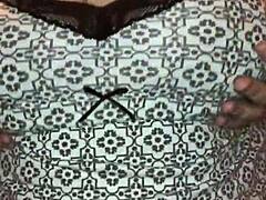 Amateurs Milf Wife Shows Off Big Ass and Big Tits in a Sexy Dance. She Shakes Her Booty Seductively for the Camera.