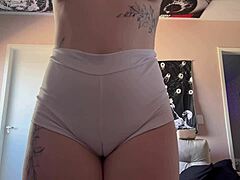 She teased with tight leggings, revealing cameltoe during intense pussy masturbation session.