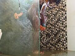 The hot ebony milf was trying her new toy in the shower when she got caught for a passionate interracial quickie.