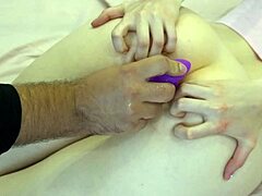 First timer girl inserts butt plug for deep anal fingering and stretching on bed