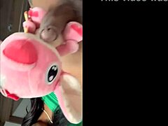 Playing with my plush toy in a cozy room setting