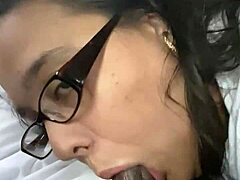 Milf high school teacher boldly sucks big black cock in car close-up.