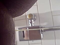 Amateur Ebony Granny Takes a Piss at Rest Stop on I-95 South Bound in Outdoor Public Bathroom with Wet Pussy Exposed