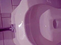 Amateur Ebony Granny Takes a Piss at Rest Stop on I-95 South Bound in Outdoor Public Bathroom with Wet Pussy Exposed