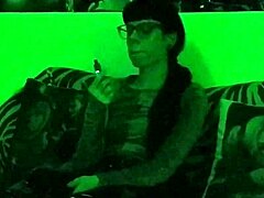 beth kinky as sexy goth domina smokes cigarette in green light hd