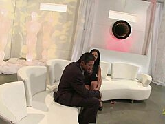 Model with big boobs gets fucked doggystyle on the white sofa!