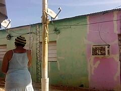 Mexican mature latina with big ass teases neighbor flashing in short dress outdoors.