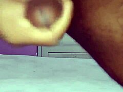 This hot young brunette with a big ass stripped to her underwear for a solo handjob session, stroking his cock until climax