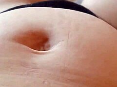 Gretala, pregnant and in a transparent thong, flashes sensually while exhibiting her body in public