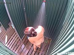 The brunette Czech milf from Europe gets caught on hidden cam while showering nude in the public pool outdoors.