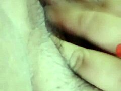 Masturbating solo with intense fingering leading to orgasm