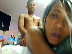 the brazilian prostitute lay on the bed with a buttplug in her ass while i fucked her hard in an interracial anal session.