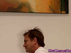 Hey, this masseuse is getting fingered right now during the session