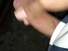 guy jerks off in public near train tracks, feeling the outdoor thrill.