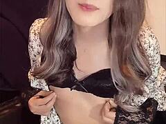 Cute ladyboy masturbates quietly in one-piece dress