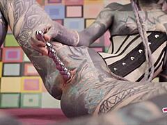 anuskatzz toys her ass in corset then squirts