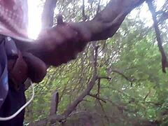 guy blasts thick cumshot deep in forest trees outdoors
