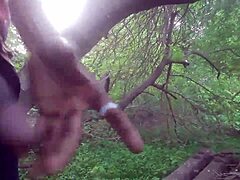 guy blasts thick cumshot deep in forest trees outdoors
