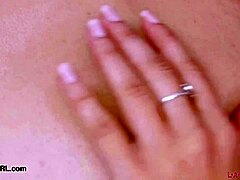 Stunning Brunette Model Poses Petite Figure on Sofa