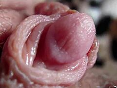 woman's huge clit throbs to squirting orgasm closeup