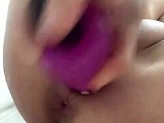 chinese babe inserts vaginal balls and vibrator for solo play