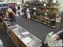 This astonishing young woman is getting fucked hard in the shop by that guy