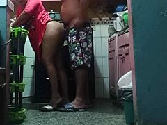 Father-in-law's big-assed wife gets kitchen-fucked while prepping food