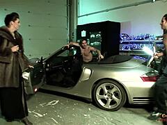 Two mechanics slam big boobed babe's shaved pussy after car fix!