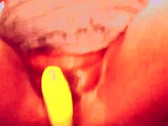 village teen stuffs veggies deep in shaved pussy while big tits bounce wildly